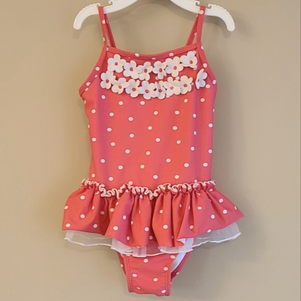 Polka dot one piece swimsuit with flower detail